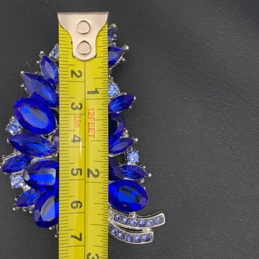 Silver tone and Large blue rhinestone brooch